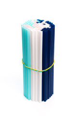 Set of colored straws for drinking cocktails on a white background. Isolated