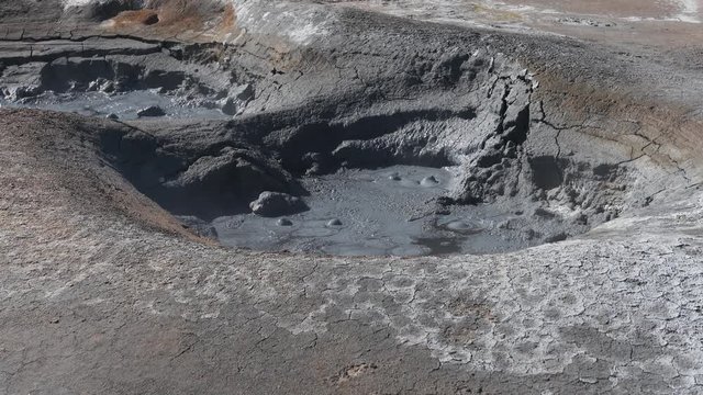 Footage of a super hot mud pool boiling and smelling really bad. Located at Namafjall in Iceland