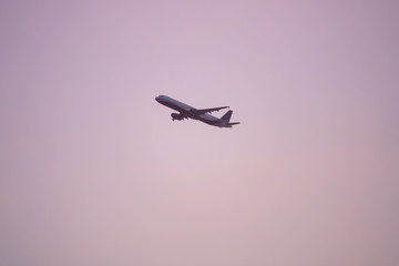 plane sunset haze