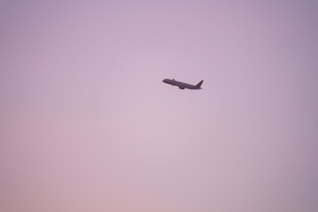 plane sunset haze