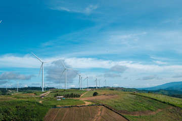 Fototapeta na wymiar windmill and blue sky in Thailand