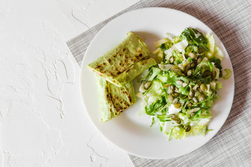 fresh vegetarian breakfast with salad and pita bread roll and cheese