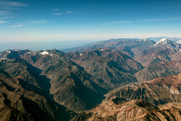 Peaks of the mountains covered with ice and snow