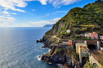Riomaggiore - Village of Cinque Terre National Park at Coast of Italy. Beautiful colors at sunset. Province of La Spezia, Liguria, in the north of Italy - Travel destination and attractions in Europe.
