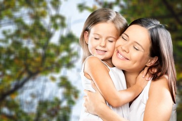 Naklejka premium Happy Mother and daughter hugging