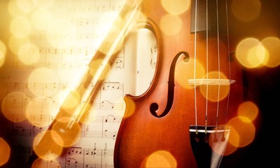 Close-up Photo Of Violin And Musical Notes