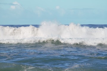 Typical rough Australian ocean, blue water, white waves … So good for a surf ride 