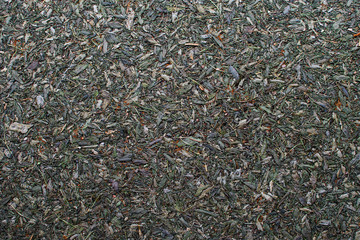 Wet sawdust surface.
