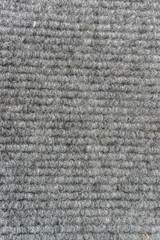 Synthetic fiber carpet