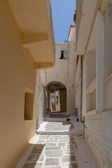 Fototapeta na wymiar The streets of the town of Chora (Cyclades, Andros Island, Greece).