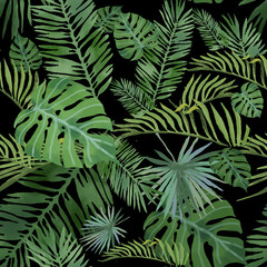 Tropical leaves pattern on black background. Bright summer pattern