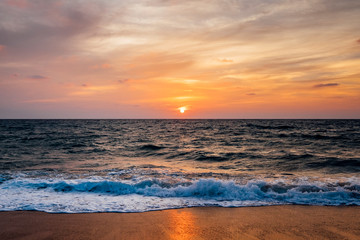 Fototapeta premium sunset beach and sea wave