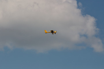 yellow light aircraft in the sky
