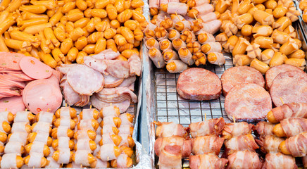 Many sausages food concept background.