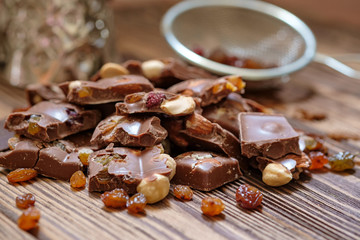 chocolate with nuts, raisins, close up  view.