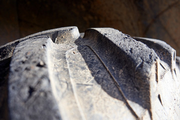 Detail of the drawing of the tires of a tractor. Background