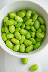 Edamame beans on bowl on a table