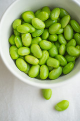 Edamame beans on bowl on a table