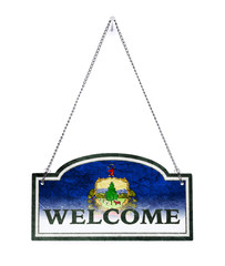 Vermont welcomes you! Old metal sign isolated