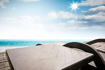 Summer chair on wooden pier and sunny day. Free space for your decoration. 