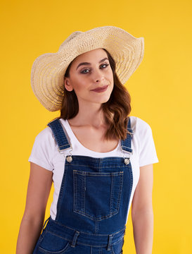 Portrait Of Beautiful Woman In Hat In The Studio Shot