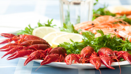 cooked shrimp and crayfish on plate close up