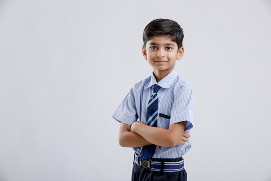 Cute little indian Indian / Asian school boy wearing uniform