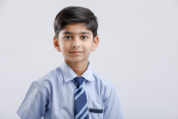 Cute little indian Indian / Asian school boy wearing uniform