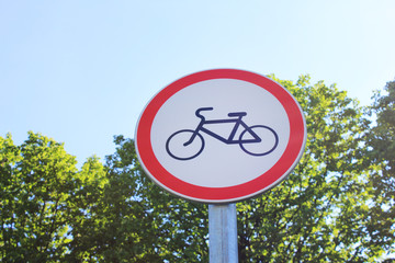 Bike route sign for cyclists at the park. Bicycle logo outdoor to warn about bike lane at city street 