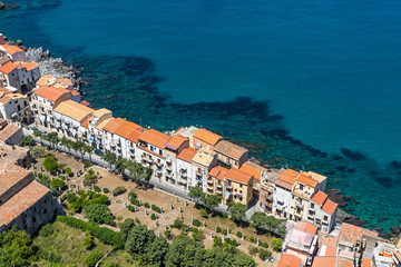 Fototapeta na wymiar Aerial view of Cefalu old town, Sicily, Italy. Cefalu is one of the major tourist attractions in Sicily. Picturesque view from Rocca di Cefalu