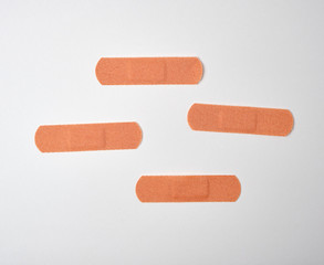 brown textile sticky patch for wounds on the skin of the body