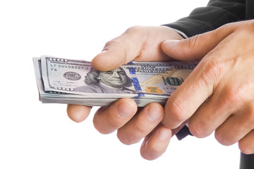 Business man holding money on white background