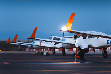 Pilot checking airplane before flight © Liam M