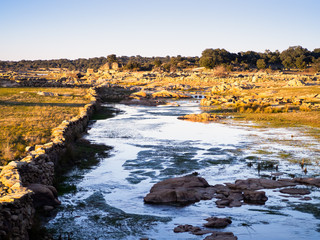 View of a section of the reservoir of La Almendra in Salamanca (Spain) in winter dry season
