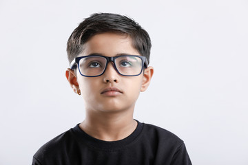 Cute little Indian / Asian boy wearing spectacles