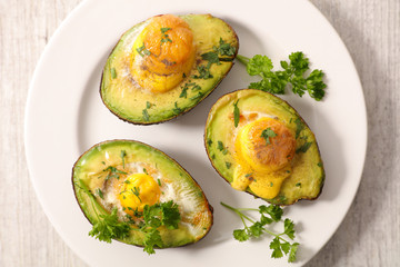 baked avocado and egg with parlsey