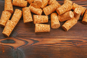 Wine corks on wooden background