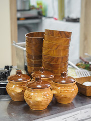 Crockery clay pots bowls in cafeteria display