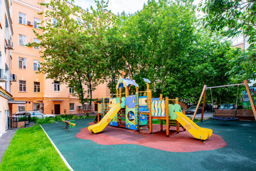 Modern playground in the courtyard of a residential building