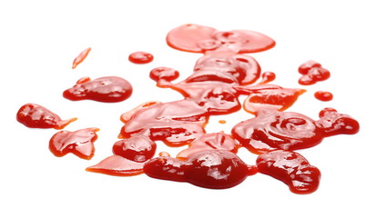 Red ketchup splashes isolated on white background, tomato pure texture