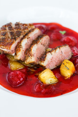 duck breast and berry sauce (meat roasting - main dish) snack. food background. top