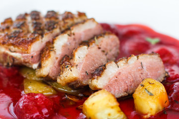 duck breast and berry sauce (meat roasting - main dish) snack. food background. top