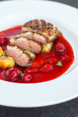 duck breast and berry sauce (meat roasting - main dish) snack. food background. top