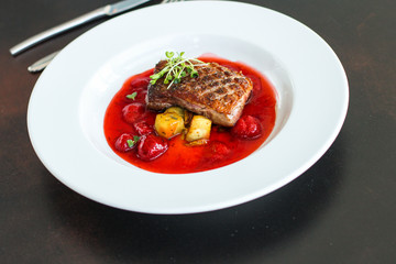 duck breast and berry sauce (meat roasting - main dish) snack. food background. top