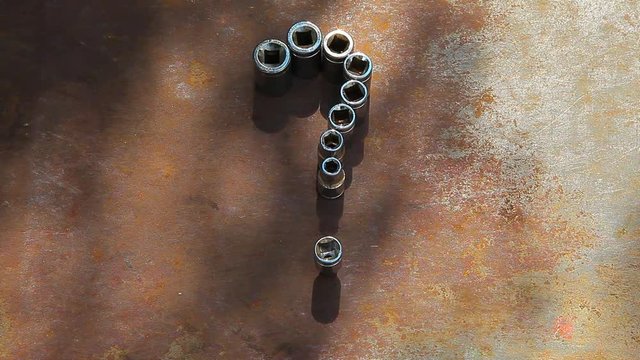 question mark construction tool metal rusty background tree shadow nobody hd footage 