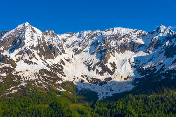 Snow-capped Mountain and Clear Sky in Switzerland.