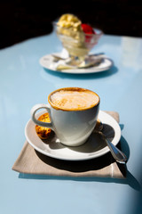 Cappuccino Coffee and Ice Cream on Table.
