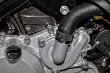 Fototapeta na wymiar Detail of the water pump of a motorcycle engine