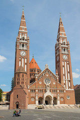 The Votive Church and Cathedral of Our Lady of Hungary is a twin-spired church in Szeged. It lies on Dm square beside the Dmtr tower. Construction began in 1913, finished in 1930