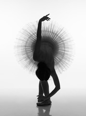 Silhouette of a ballerina. Black and white photo.
